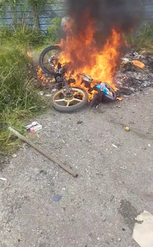 Motorcycle burning away