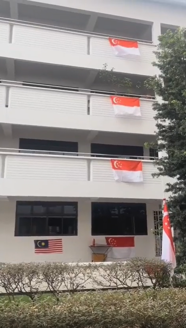 M'sian and sg flags being placed together