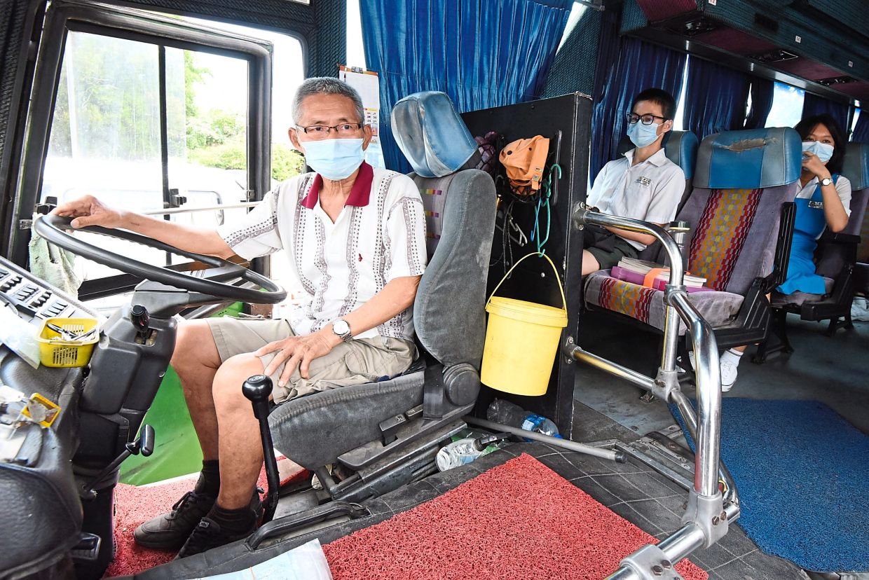 M'sian bus driver fetching students to school
