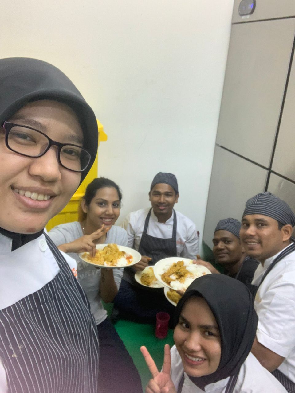 Msian chefs eating at store room