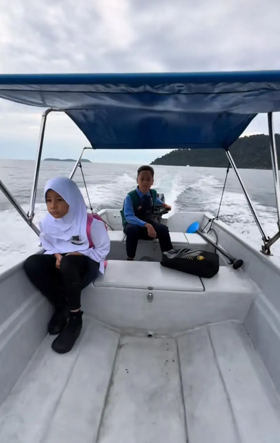 M’sian Father Rides A Boat To School Daily With His Kids For 7 Years So They Can Learn Like Everyone Else