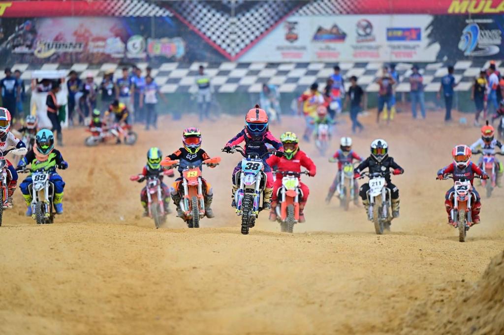 Msian kids competing at a motocross