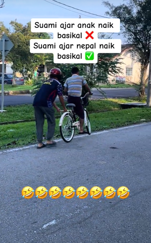 M'sian man teaches nepali man how to ride a bike