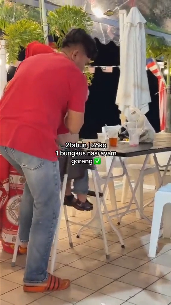 M'sian man tries getting his son off high chair