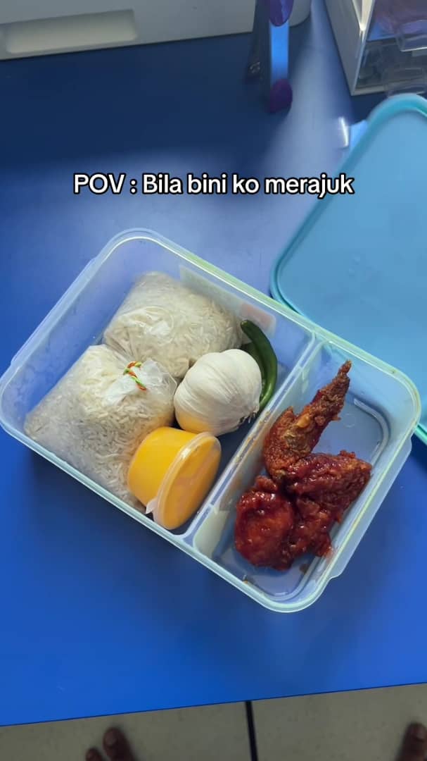 Msian man's luncbox with raw ingredients