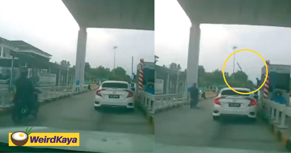 M'sian motorcyclist tries to speed past car lane at toll, hits boom gate & falls | weirdkaya