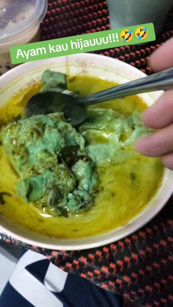 Msian scooping the green chicken in a bowl
