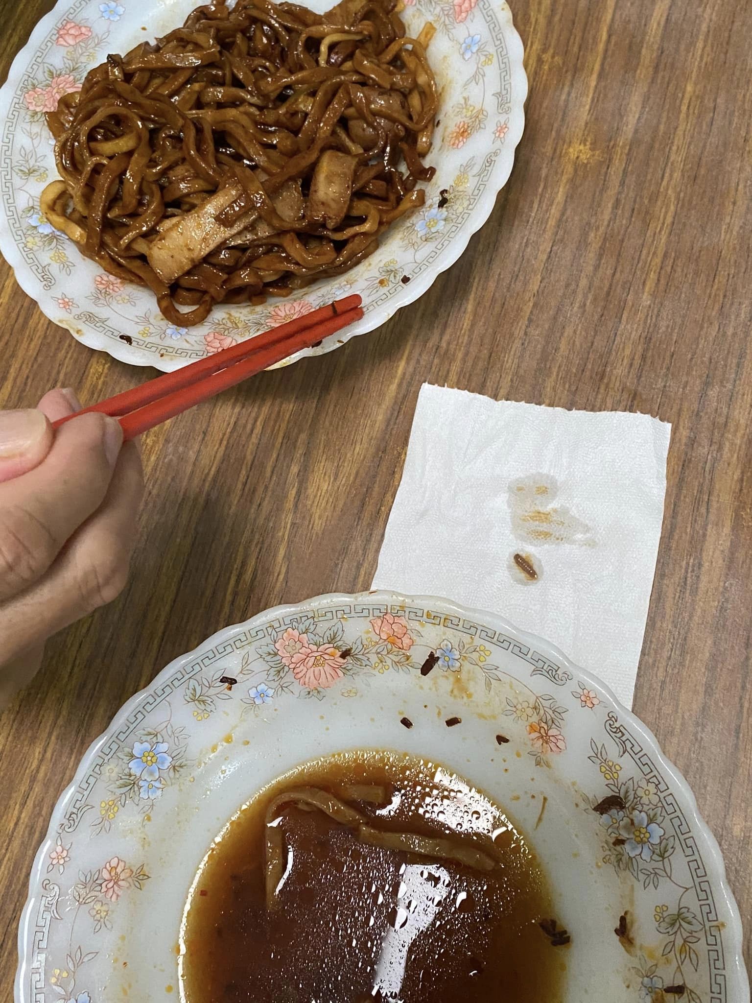 Msian showing insects found in their noodles meal