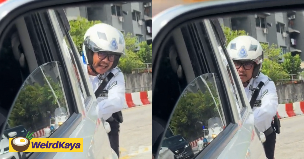 M'sian traffic officer praised for helping woman push her broken-down car in penang | weirdkaya