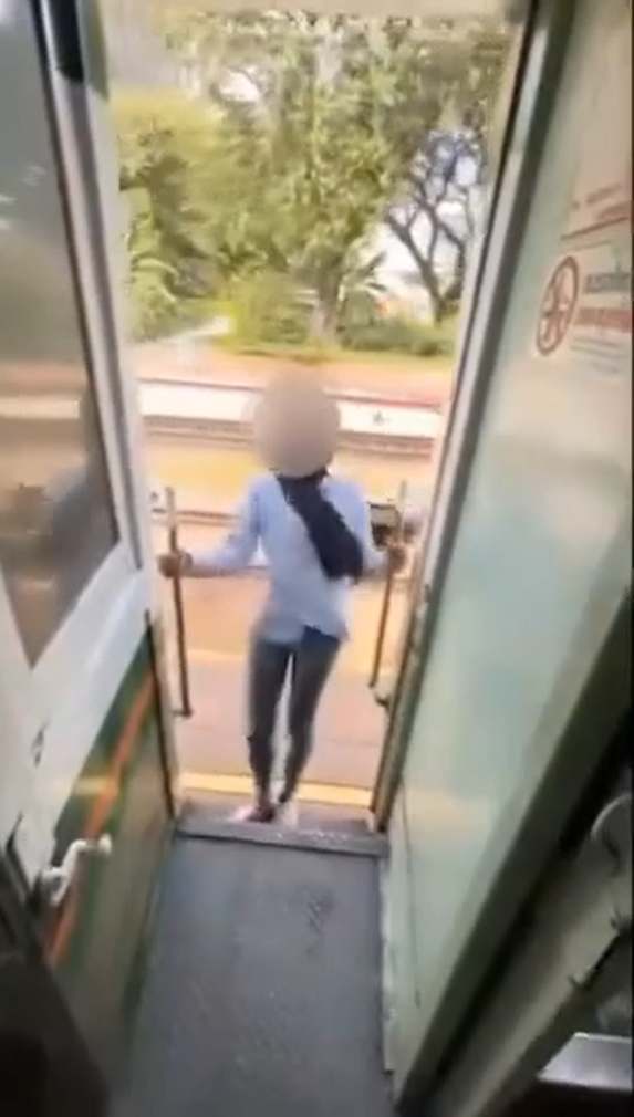 M'sian woman 'hangs out' from moving train in thailand