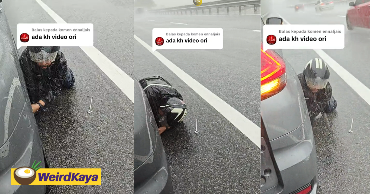 M'sian Woman Moved To Tears After Receiving Help From Motorcyclist To Change Tyre In Pouring Rain