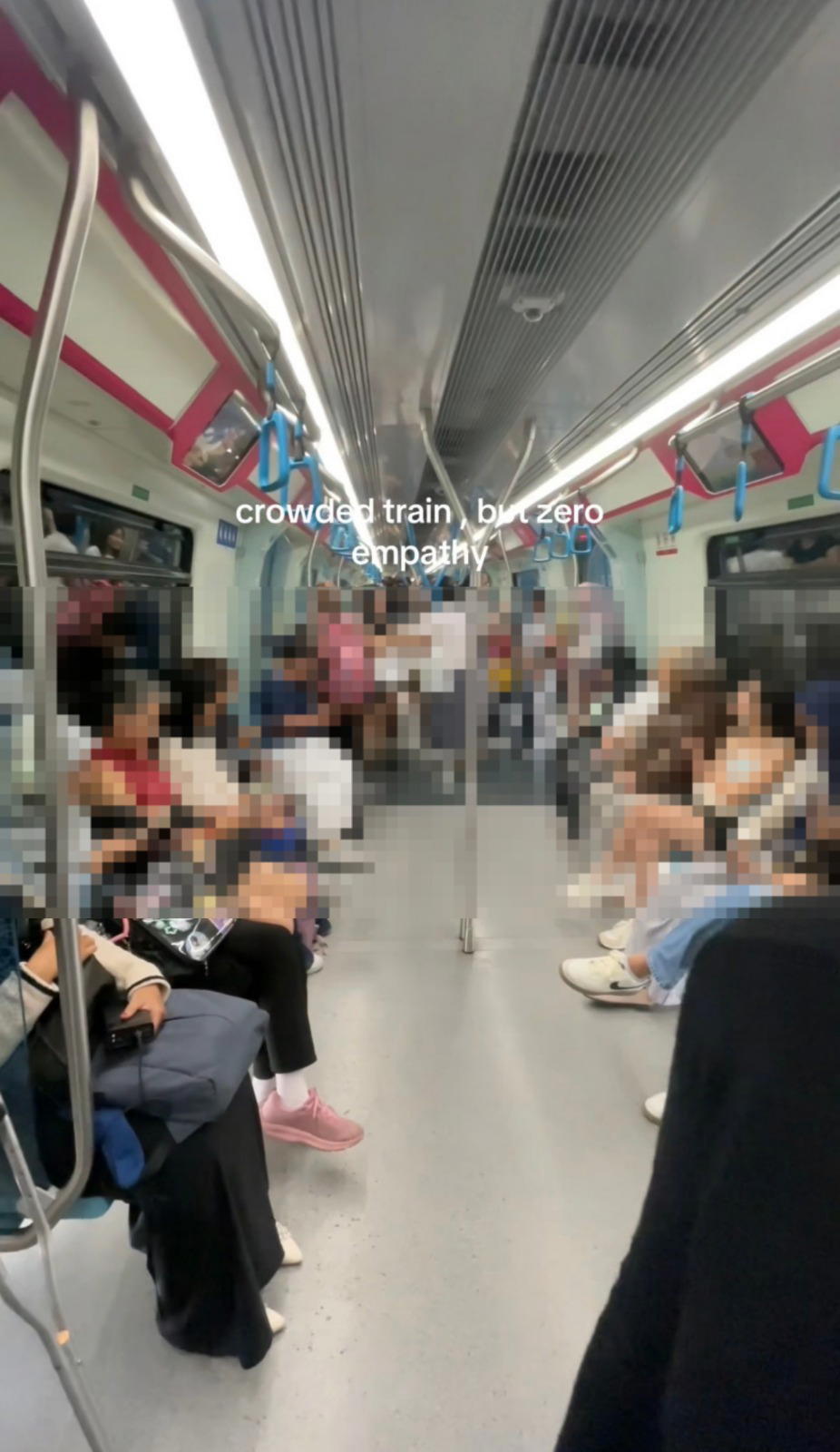 M'sian Woman On Crutches Left Standing Inside MRT Women’s Coach, Netizens Slam Lack Of Courtesy