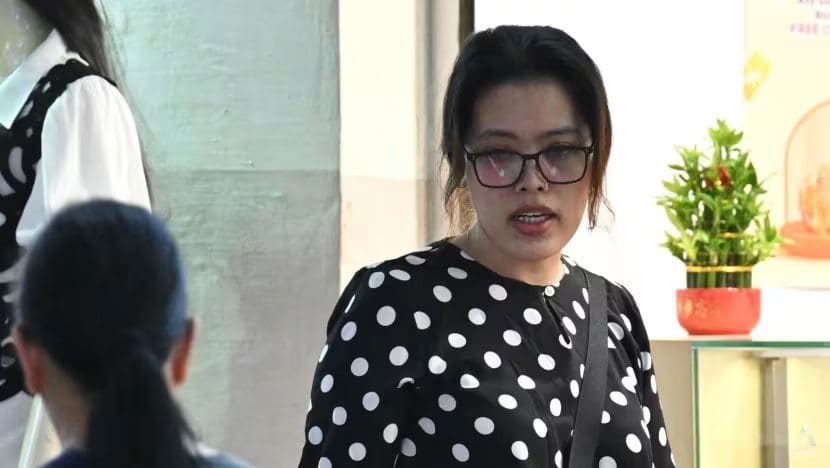 msian woman outside a court in singapore
