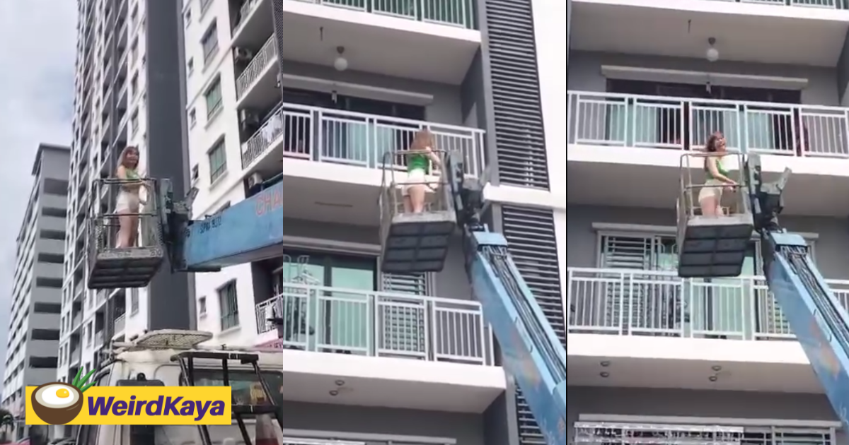 M'sian woman rides a crane all the way up to her house after she was locked out | weirdkaya