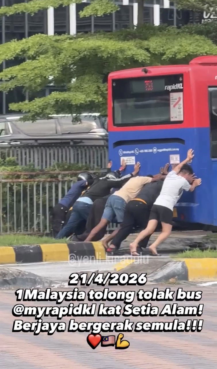 msians pushing rapidkl bus