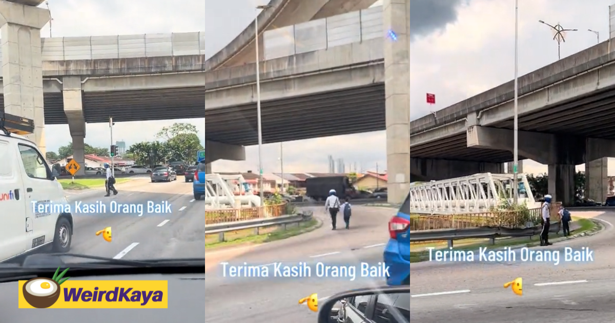 M'sians traffic police seen holding student's hand while crossing road, melts netizens' heart | weirdkaya
