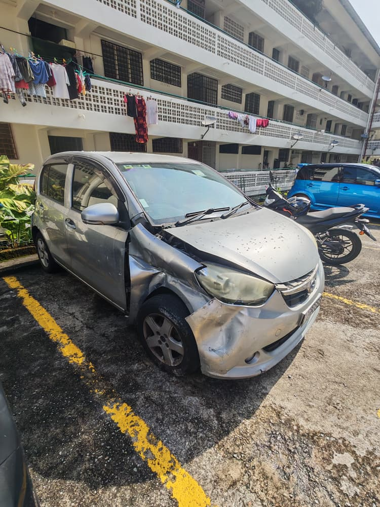 Myvi damaged by rocks in Ampang