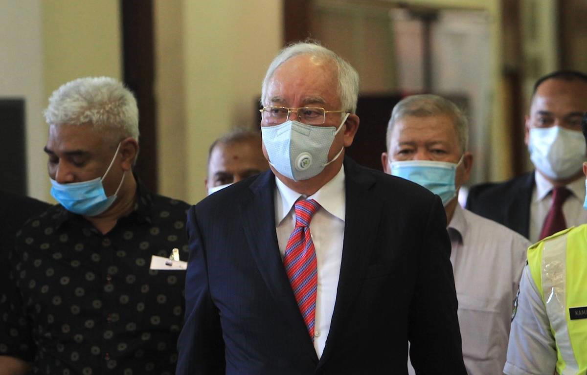 Jailbird najib brushes claims that he will be 'released immediately' if bn wins #ge15