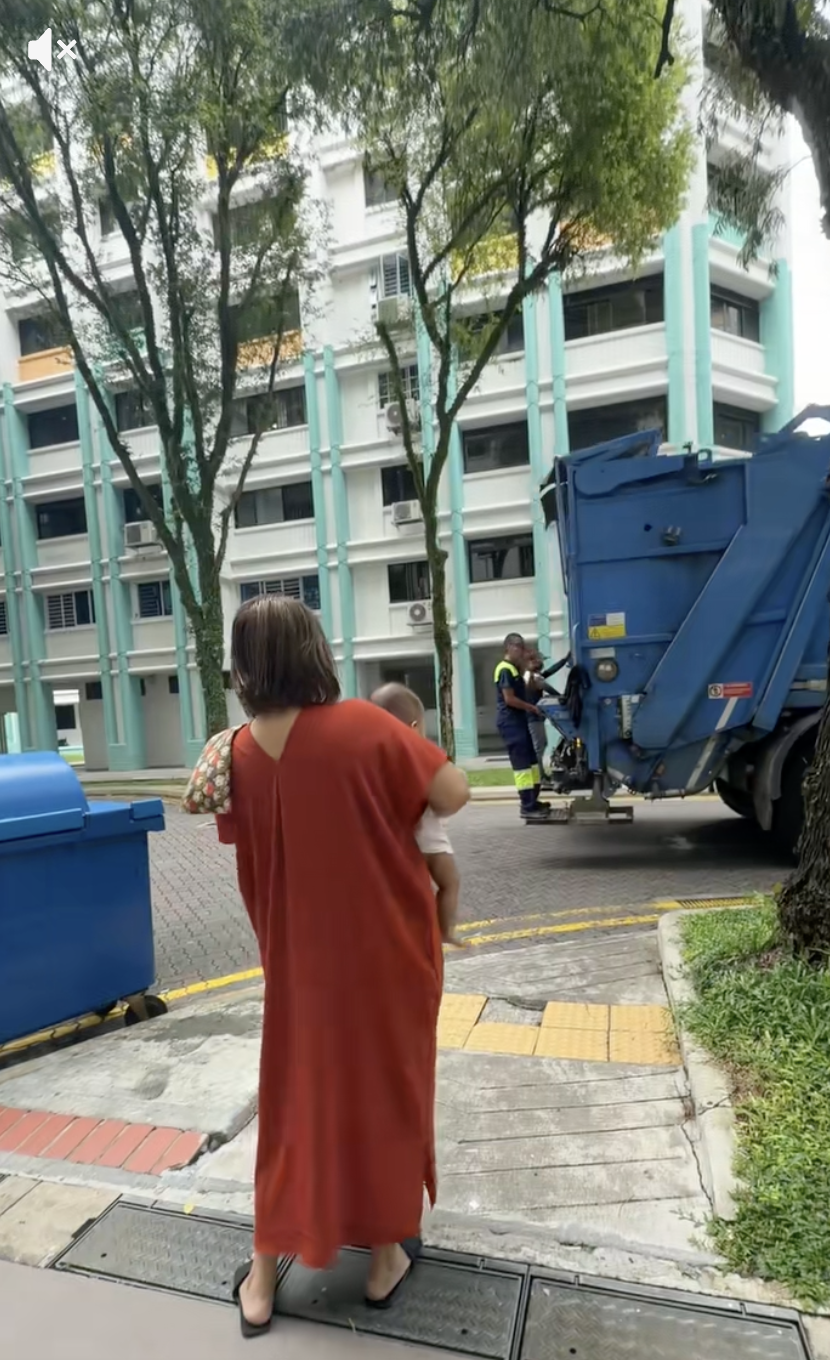 Nora showing her newborn his father working 01