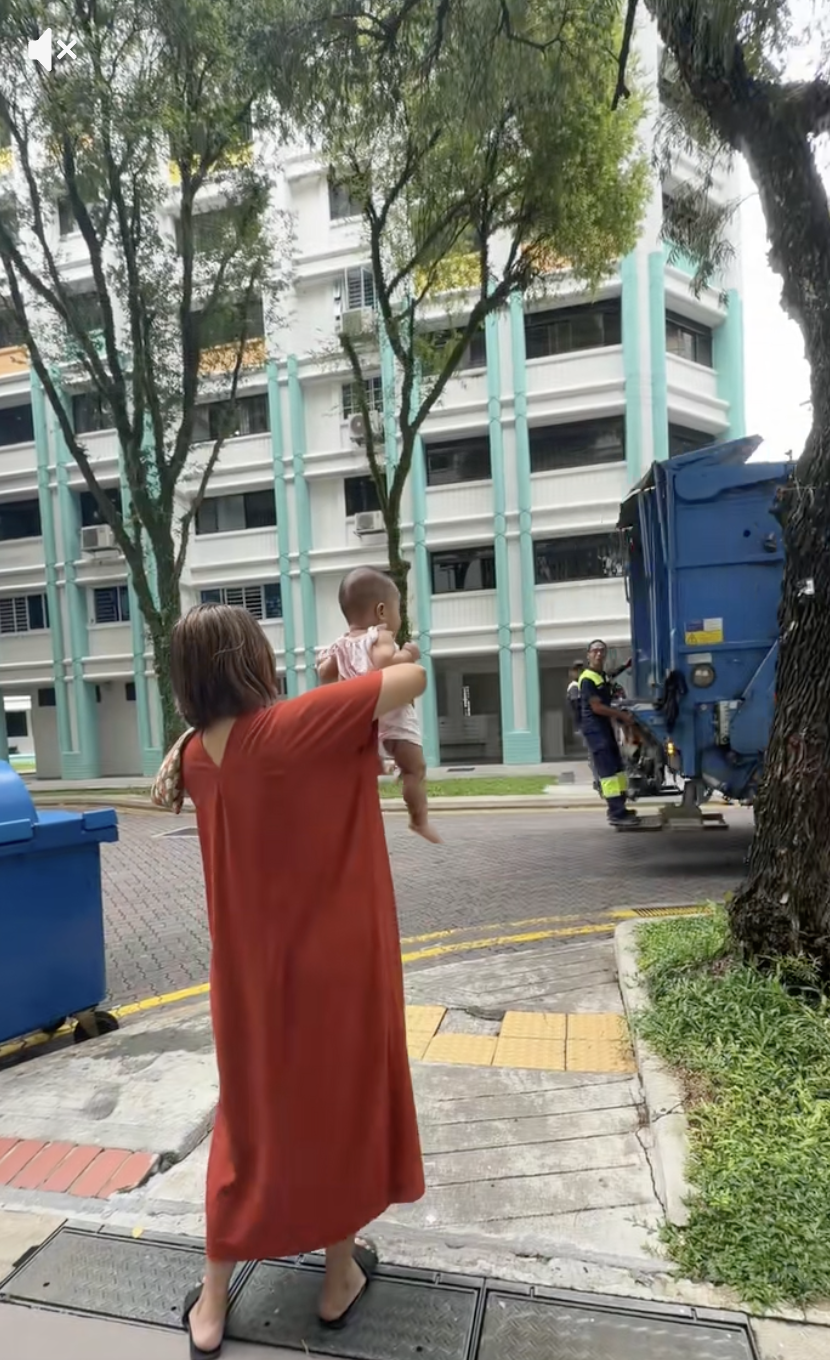 Nora showing her newborn his father working 02