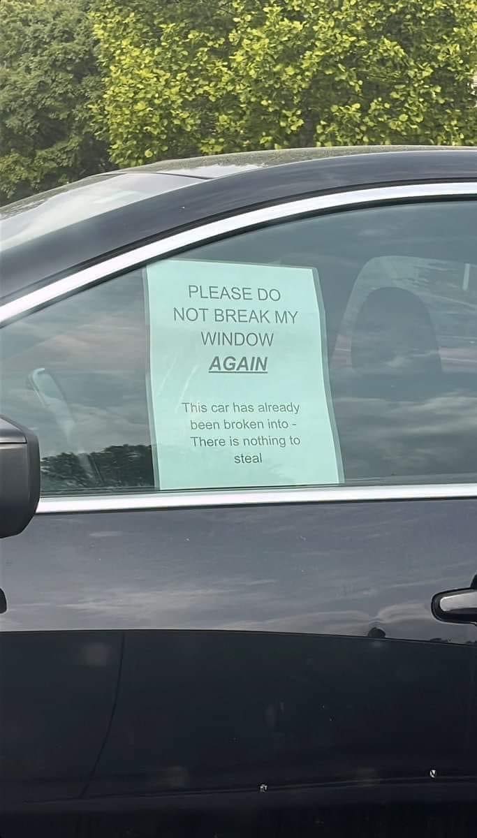 'nothing to steal' sign on car window