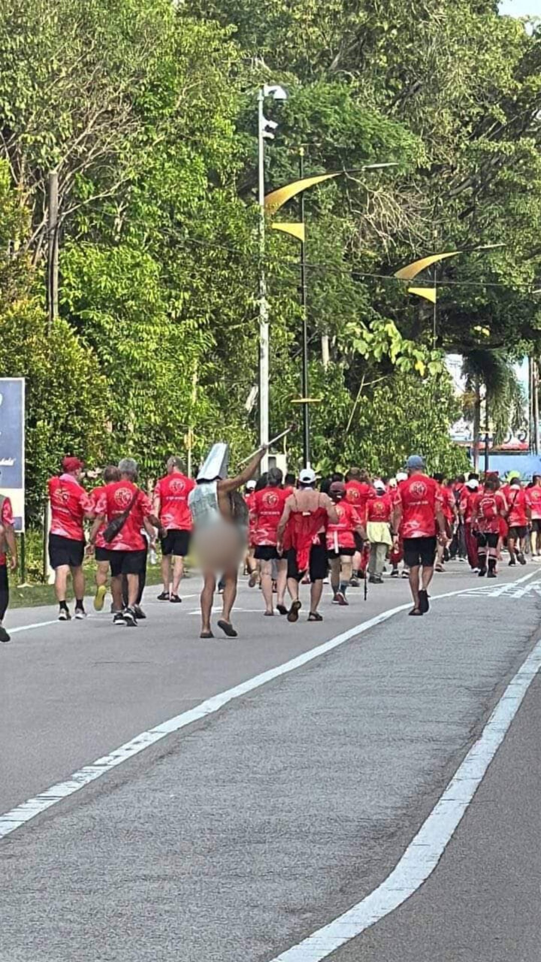 One of the pan asia international run running topless