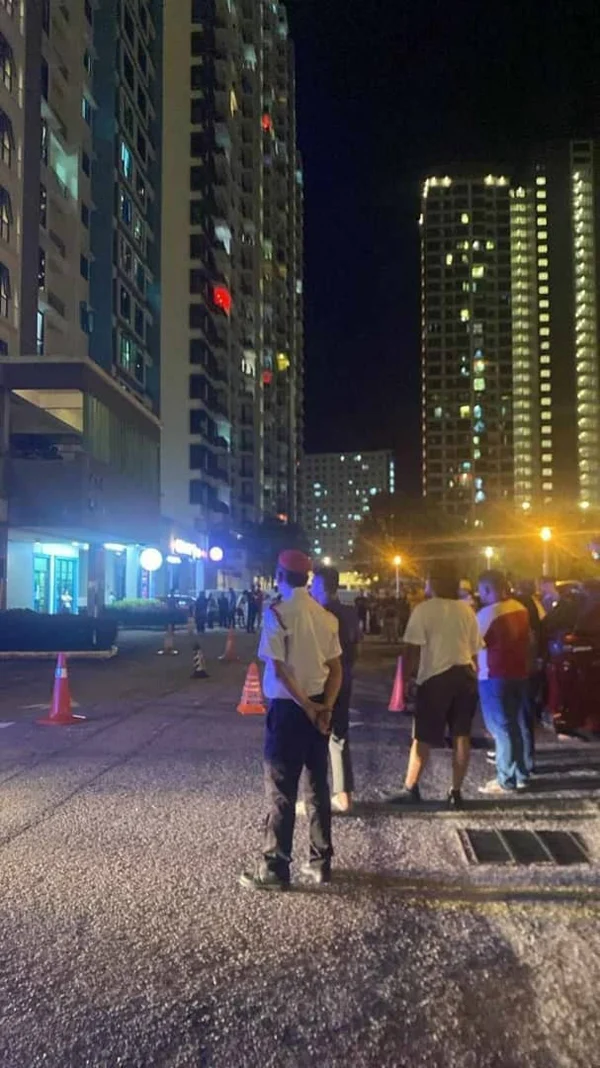 Onlookers gathering around at Sungai Ara apartment 1