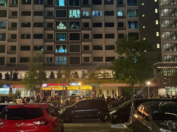 Onlookers gathering around at Sungai Ara apartment 2