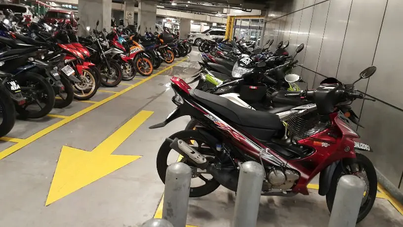 parked motorbikes inside parking lot