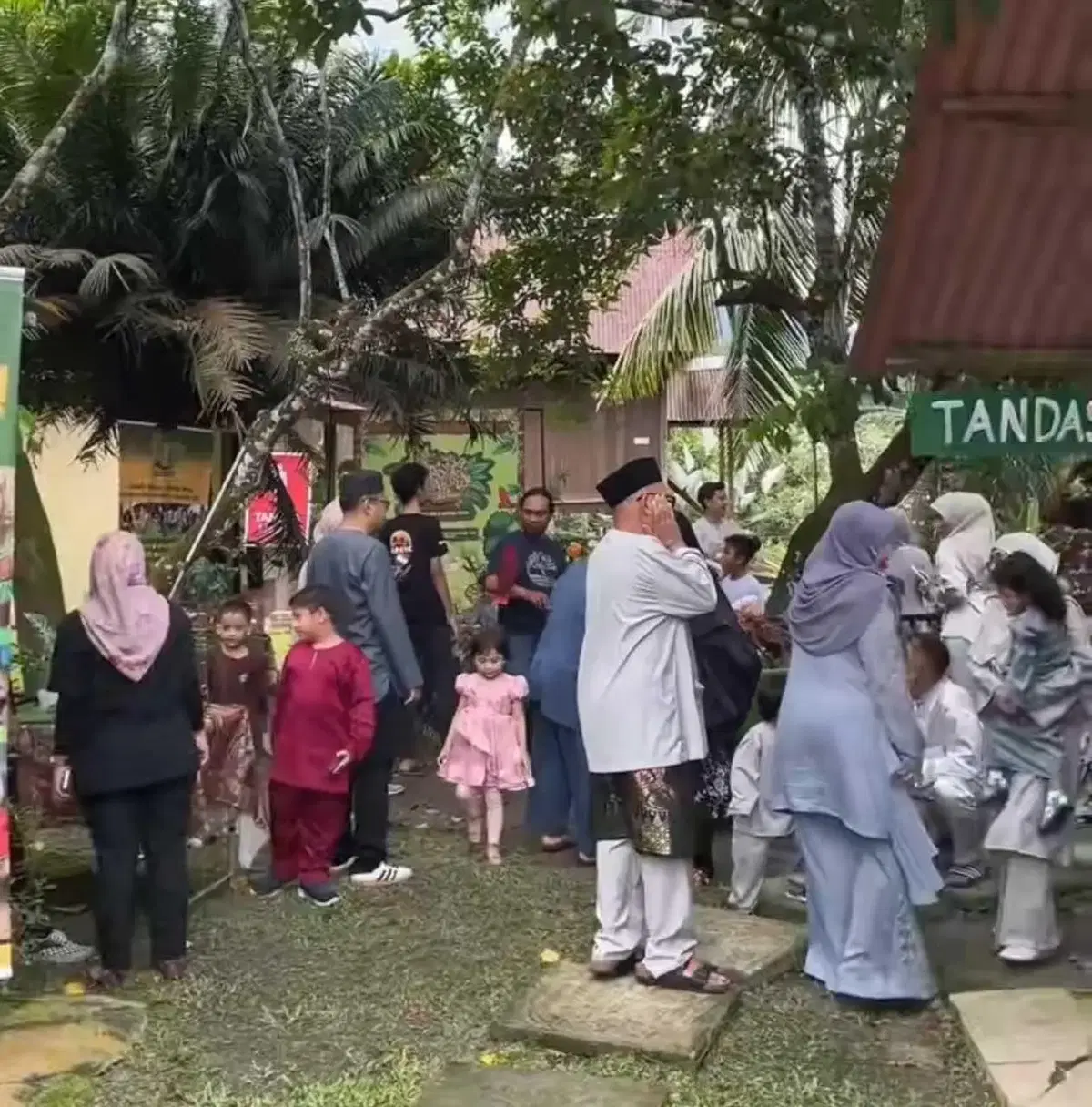 People enjoying the petting zoo