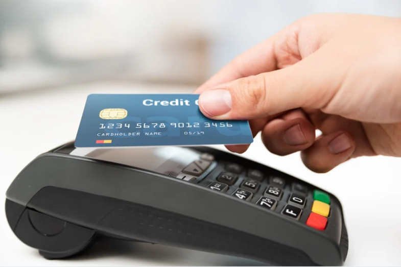 Person using credit card