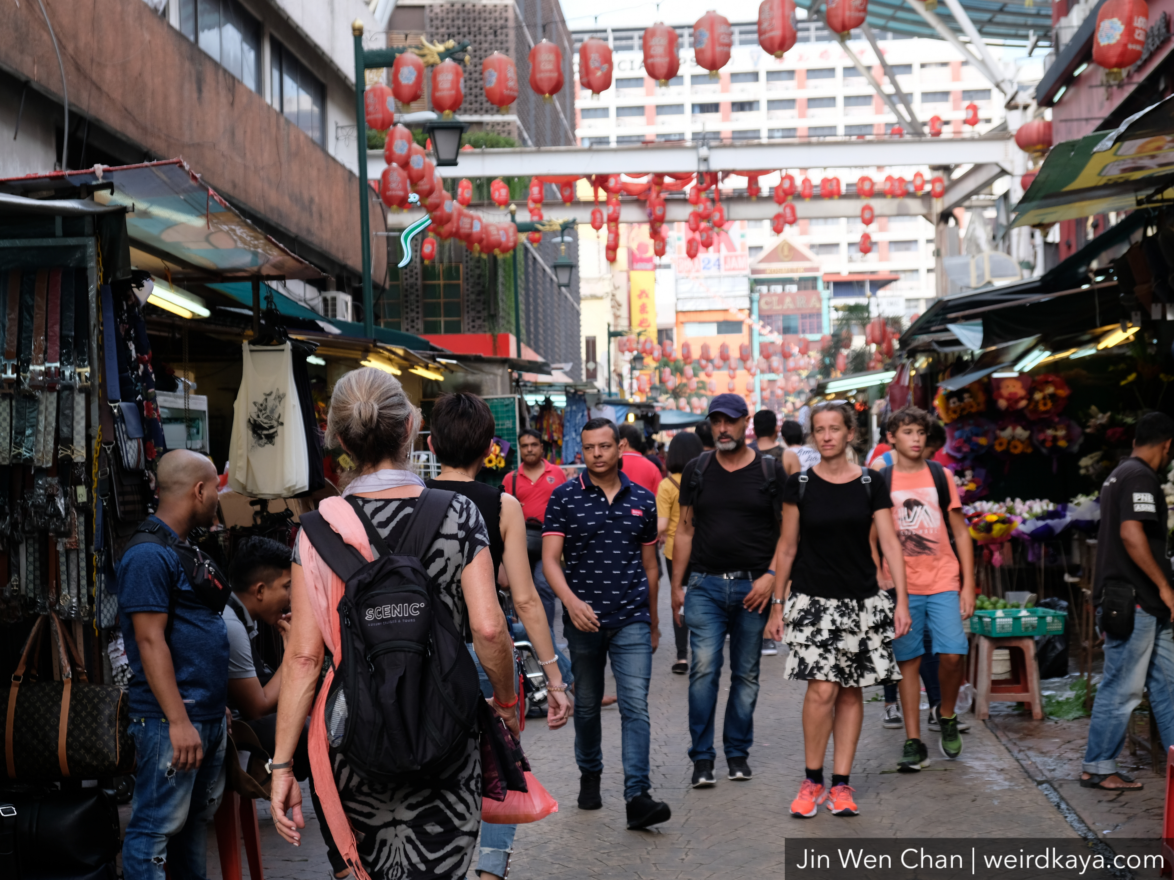 Tourists walking around petaling street