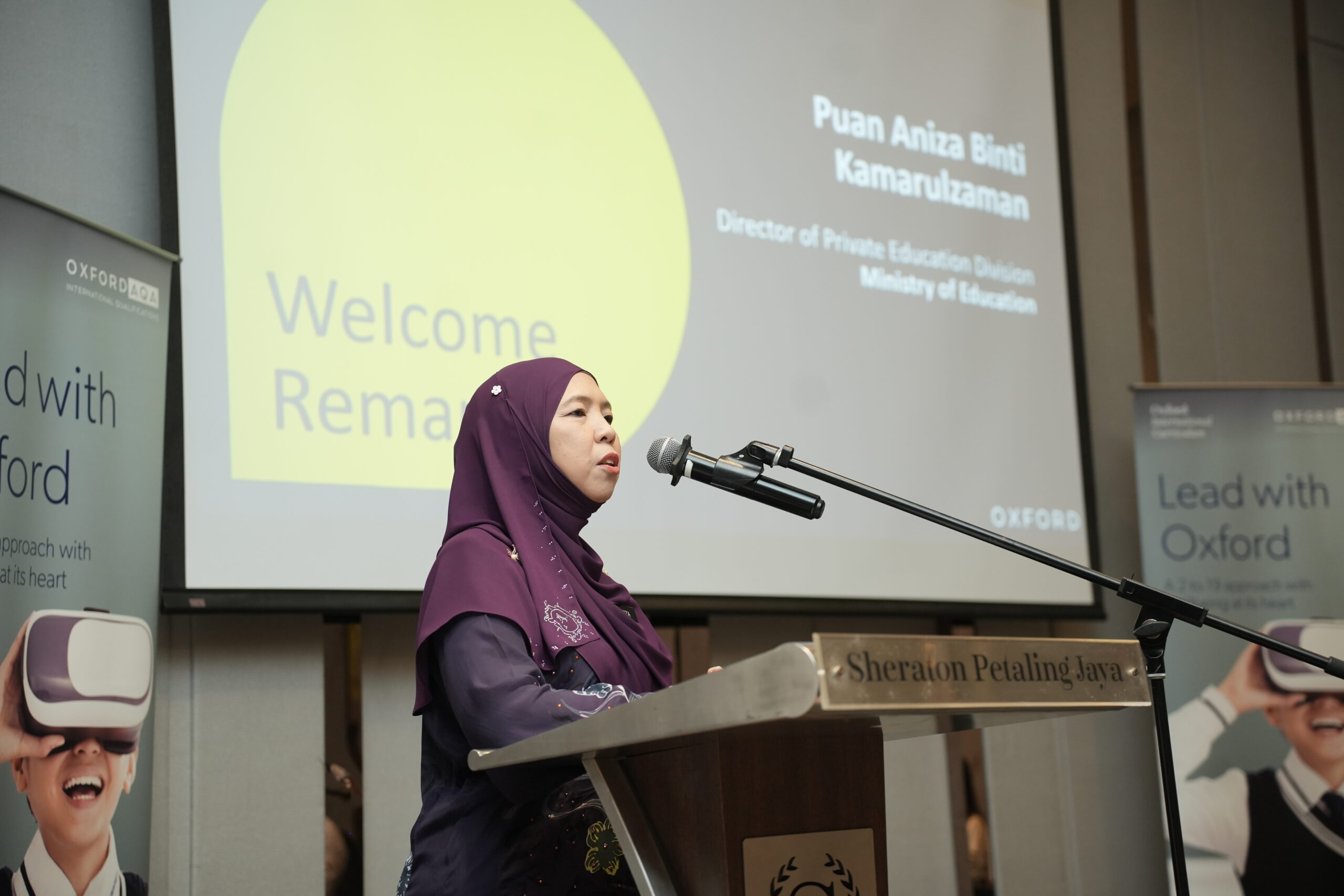 Puan aniza addressing the participants