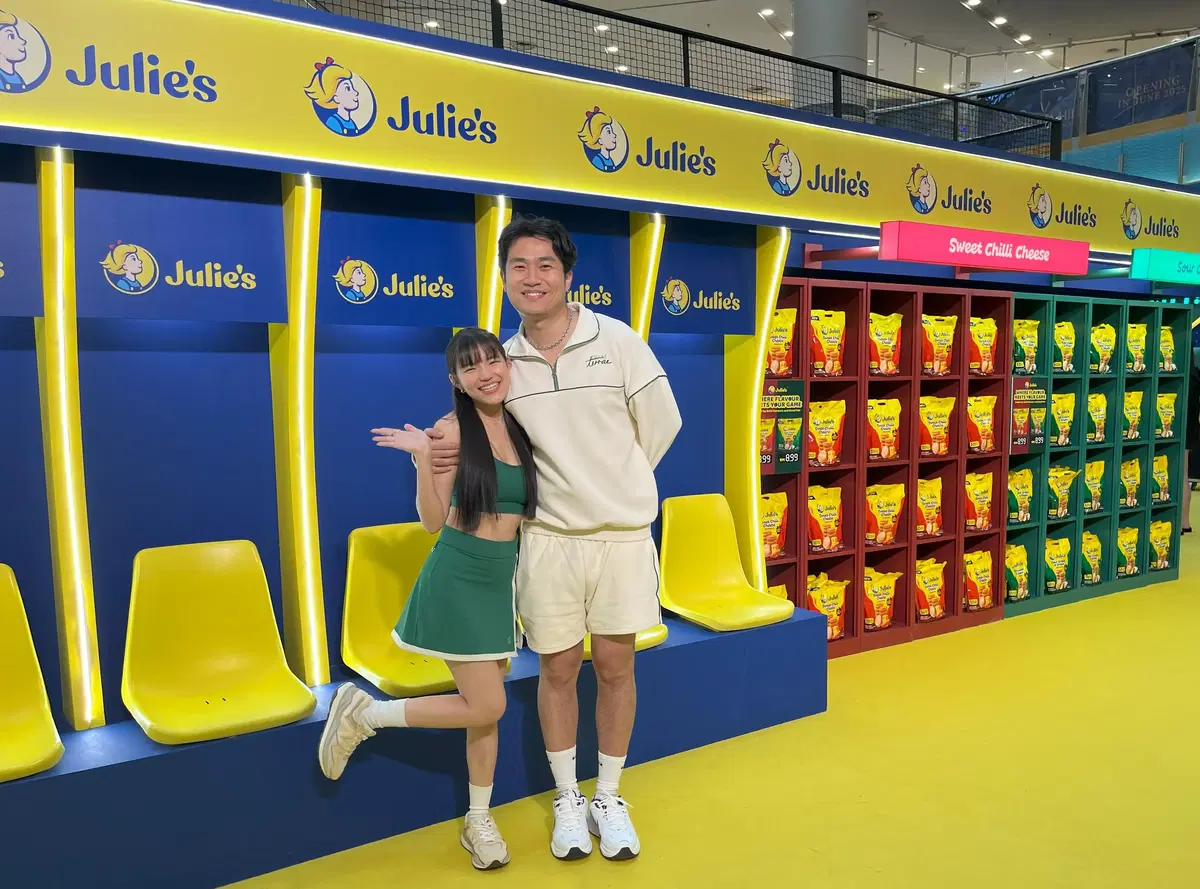 Fun and playful photobooth area designed to look like a player bench and locker room featuring Wabikong content creators Sai and Bernice