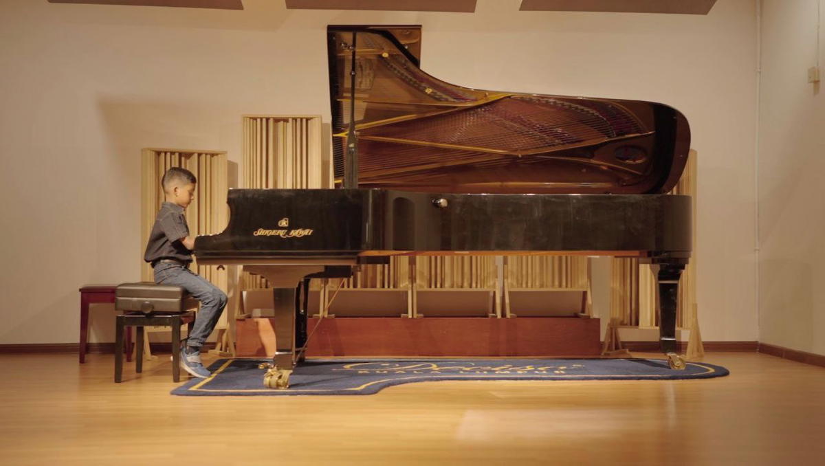 7yo josiah raj playing the piano