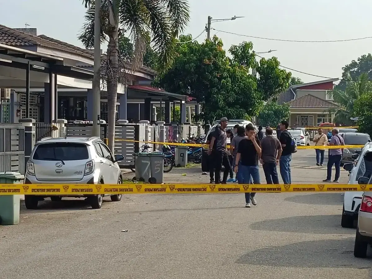 Police at scene of double murder in Melaka
