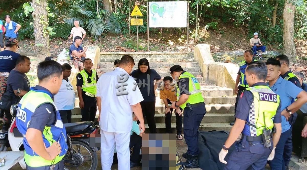 Police looking on at Lim's body