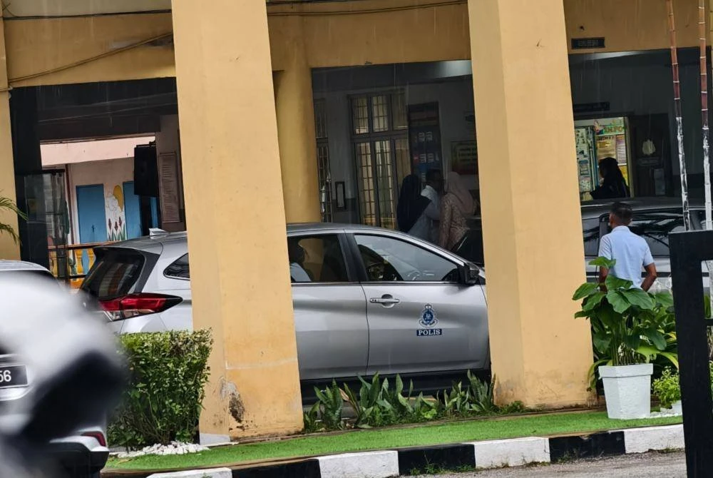 Police outside school where 10yo died inside toilet