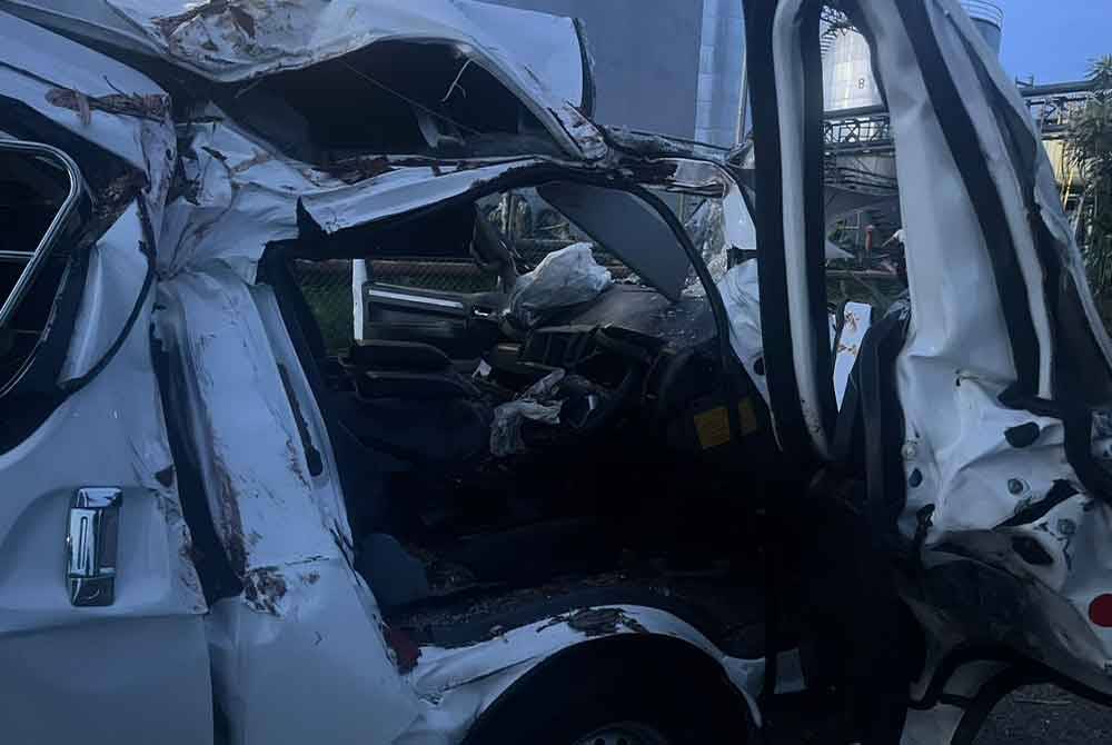 Police vehicle damaged by tree in sabah