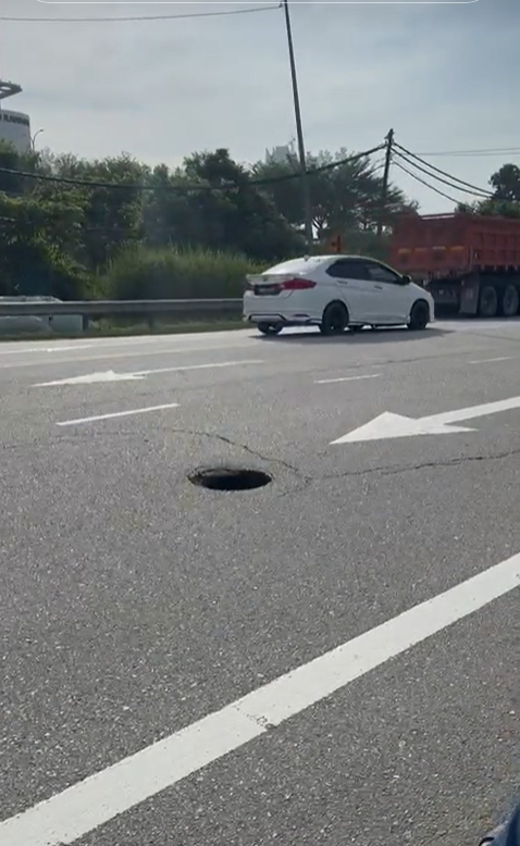 Pothole in the middle of the road