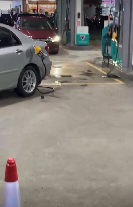 Fuel pump at petronas petrol station gets ripped off