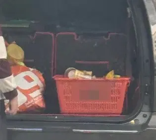 Putting basket in car