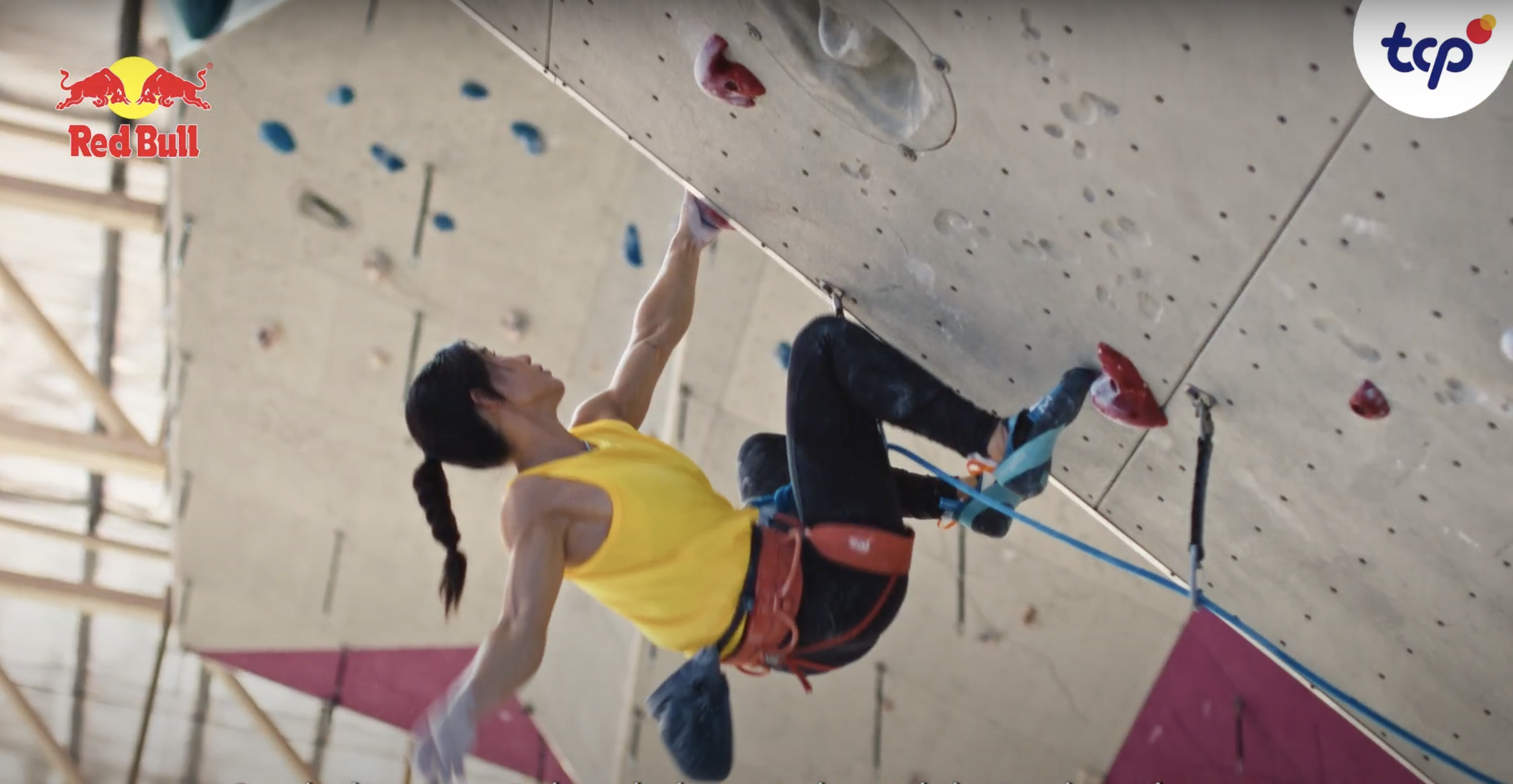 Renee on the wall in red bull video 1