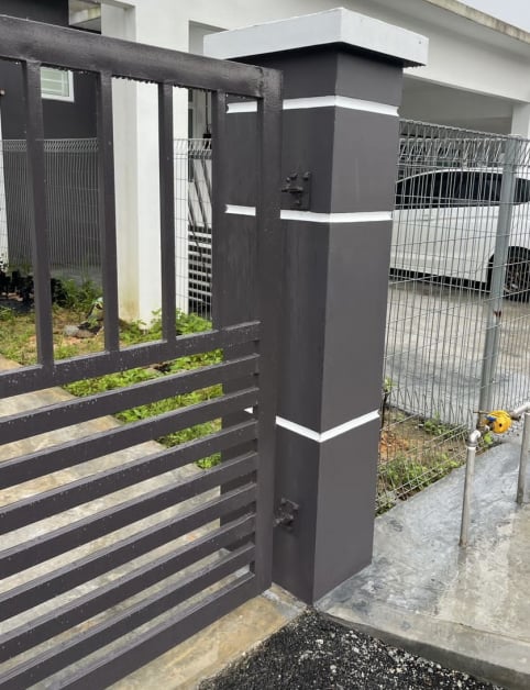 M'sian homeowner shocked to find toppled gate pillar filled with trash instead of cement | weirdkaya