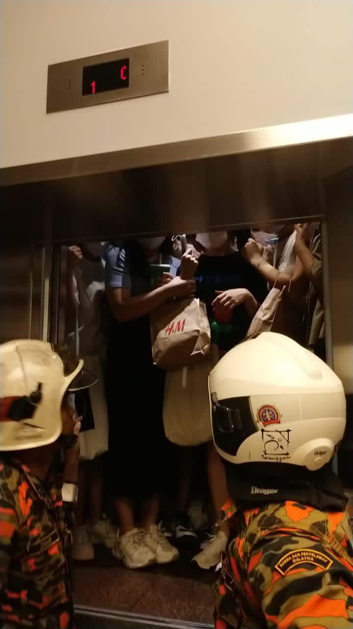 [video] firemen rescue not one, but 19 girls who got stuck inside elevator