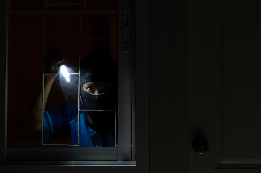 robber looking through window