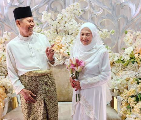 Rohani and her husband yusof embi