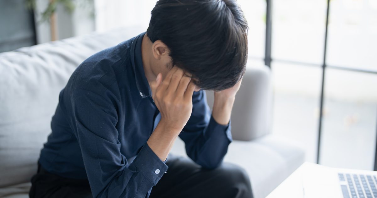 sad asian man