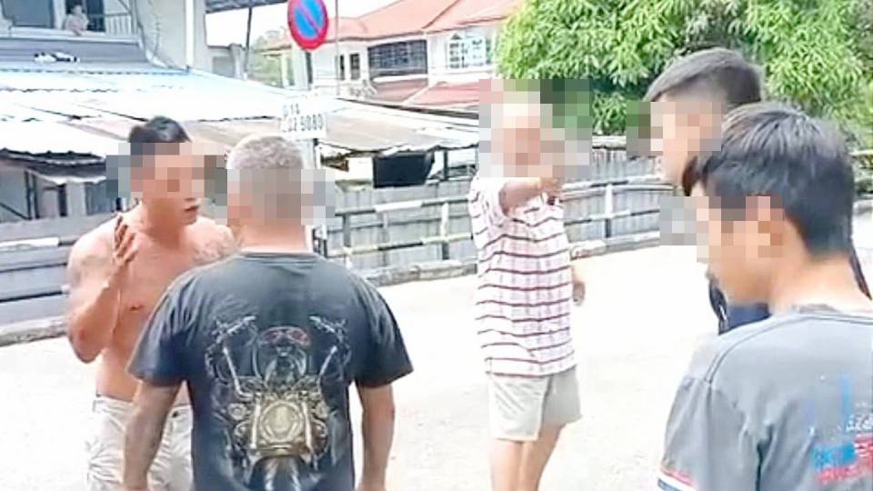 Malaysian father and son arguing with people using meat cleaver over loud noise in sibu sarawak