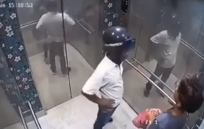 Robber ambushing a teenager in lift